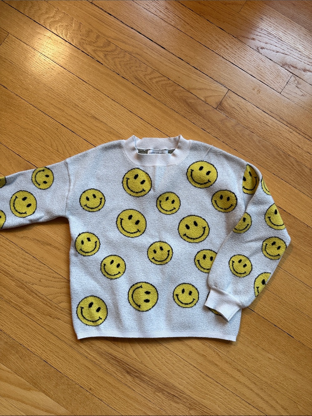 cupcakes & cashmere White Crewneck Sweater with Yellow Smiley Faces